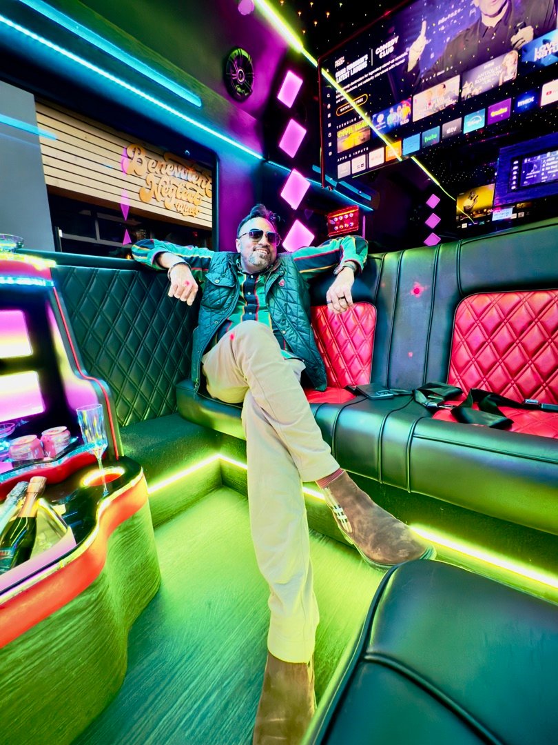 Deep Singh in luxury party bus with neon lights